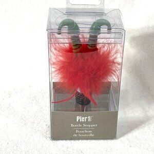 Pier 1 upside-down elf holiday wine bottle stopper.